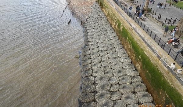 Rock Bags placed before a concrete wall for added protection