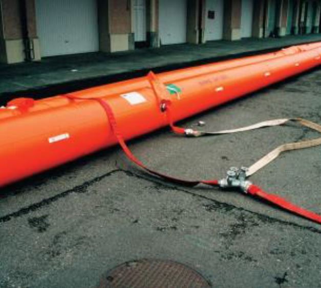 Hoses connected to Beaver® flood barrier tubes