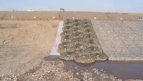 Creating erosion protection systems with rock bags